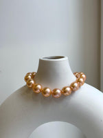 Elly’s 16pcs 9.8-11mm Natural Sunset Peach Gold Edison Pearls Bracelet: Extreme luster mirrored, 8” knotted, S925 silver Bracelet. gift for her birthday