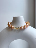 Elly’s 16pcs 9.8-11mm Natural Sunset Peach Gold Edison Pearls Bracelet: Extreme luster mirrored, 8” knotted, S925 silver Bracelet. gift for her