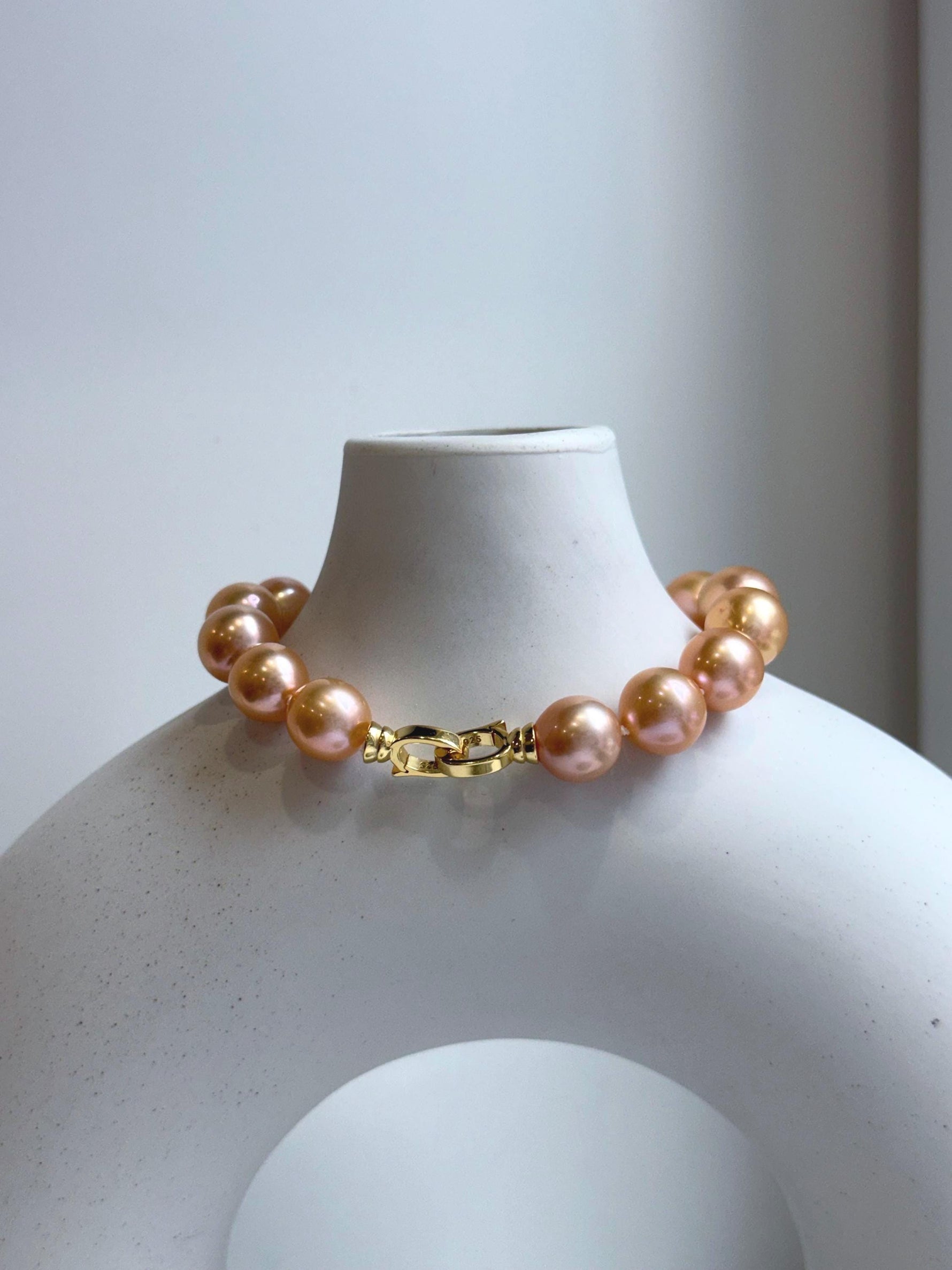 Elly’s 16pcs 9.8-11mm Natural Sunset Peach Gold Edison Pearls Bracelet: Extreme luster mirrored, 8” knotted, S925 silver Bracelet. gift for her