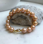 Elly’s 16pcs 9.8-11mm Natural Sunset Peach Gold Edison Pearls Bracelet: Extreme luster mirrored, 8” knotted, S925 silver Bracelet. gift for her