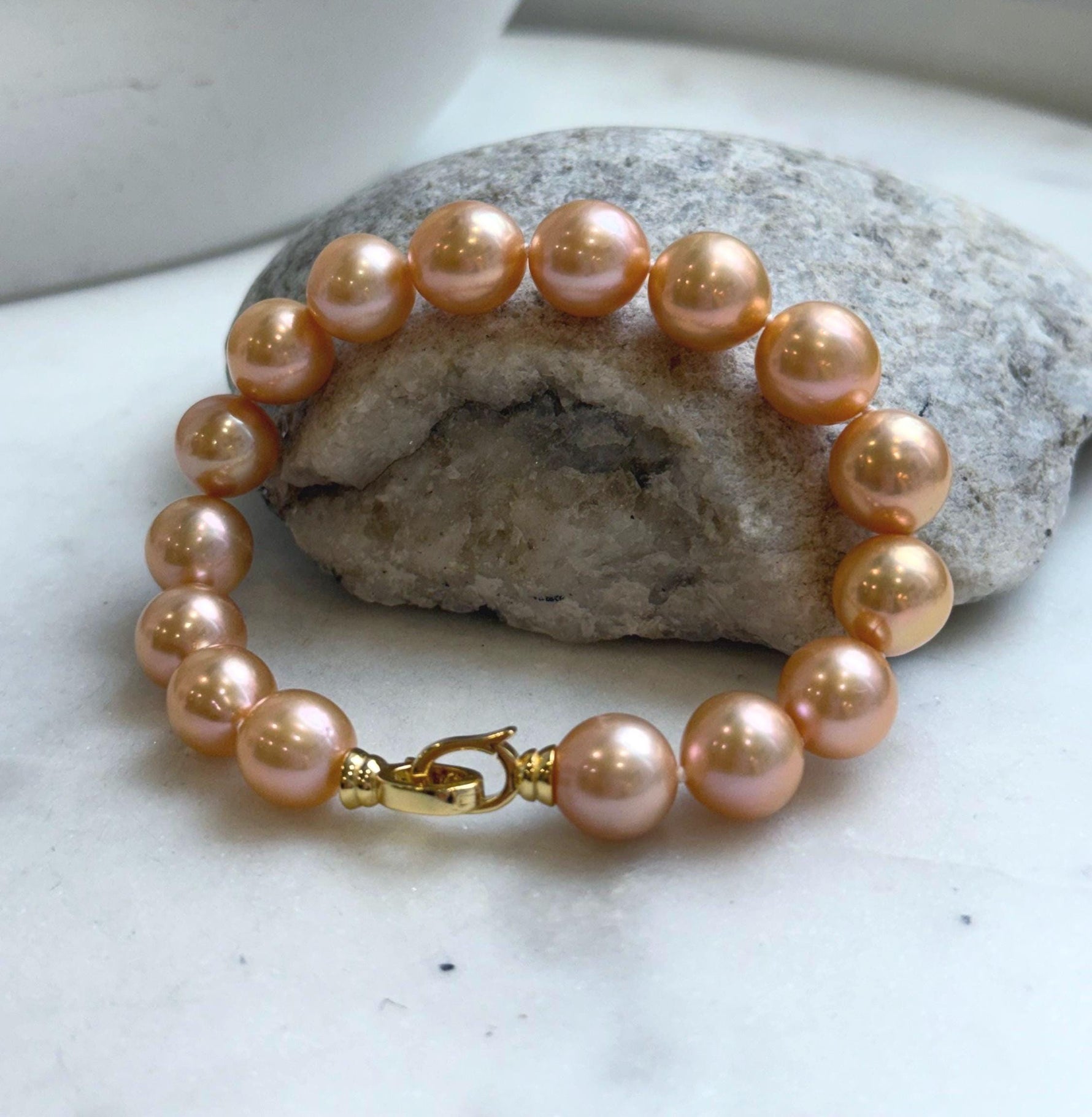 Elly’s 16pcs 9.8-11mm Natural Sunset Peach Gold Edison Pearls Bracelet: Extreme luster mirrored, 8” knotted, S925 silver Bracelet. gift for her