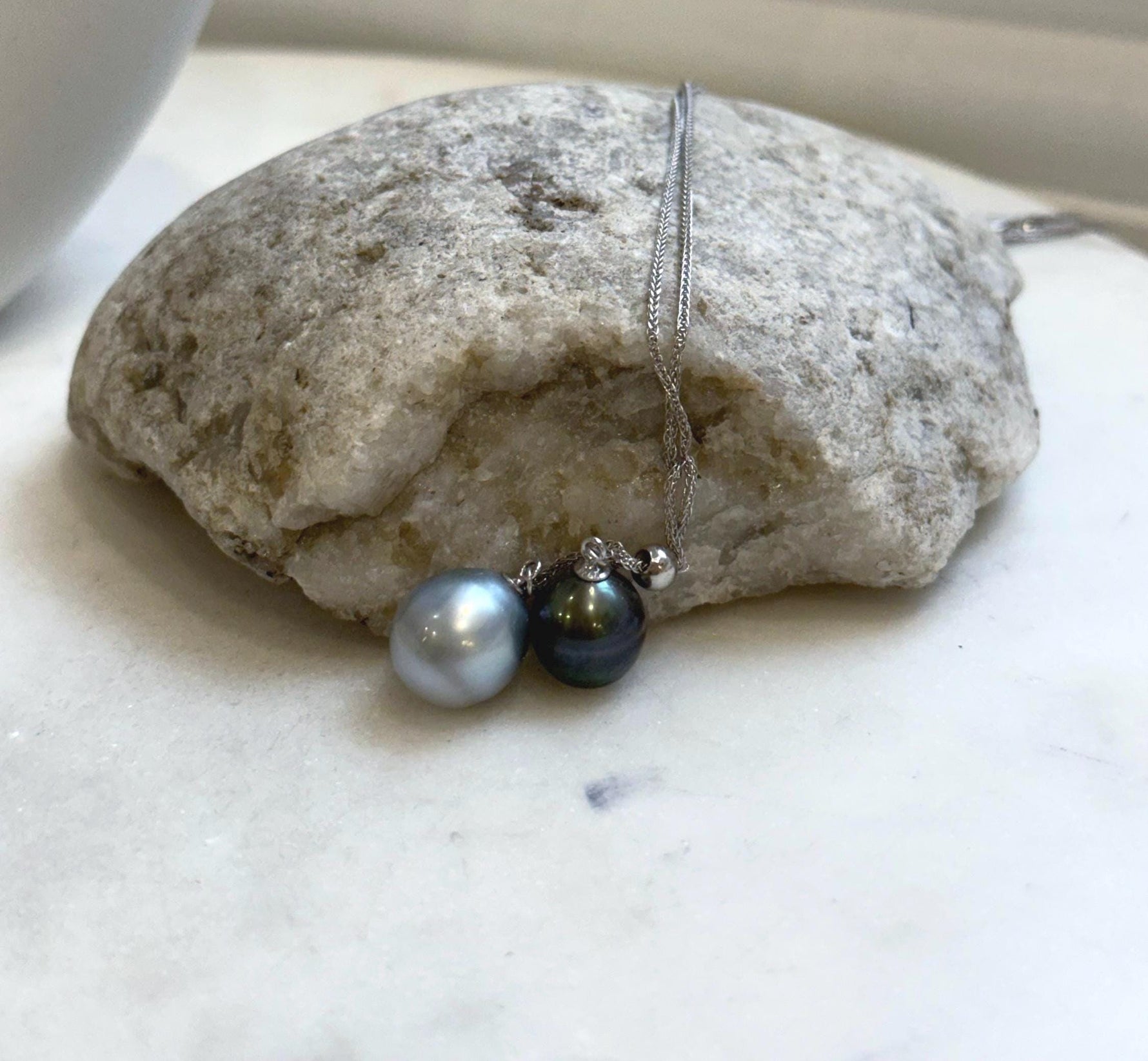 Elly’s 9.9-11.1mm Double Tahitian platinum peacock green ocean pearls Necklace: extreme luster mirrored, S925 silver chain set.