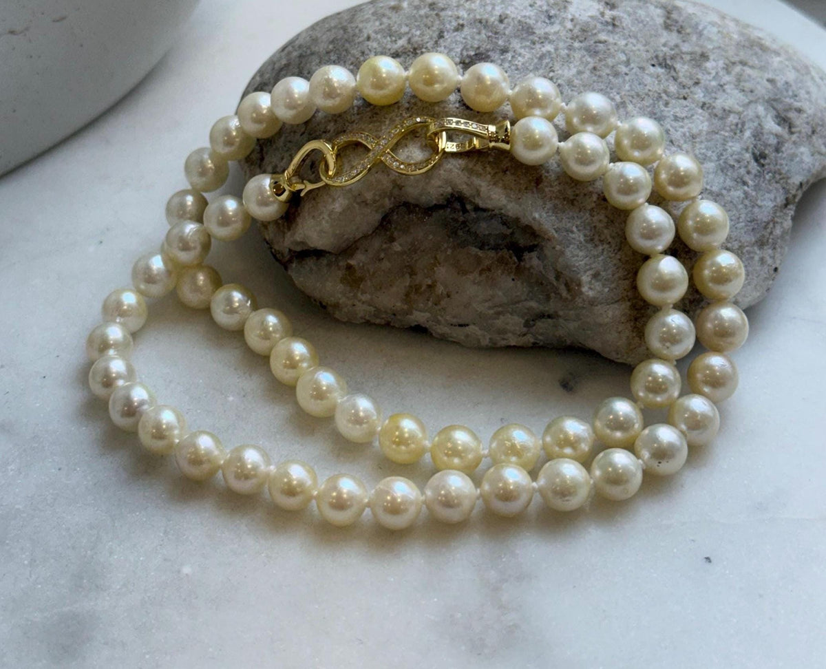 Elly’s 6.8-7.3mm 61pcs Akoya ivory gold ocean pearls necklace:Extreme luster mirrored, knotted, 18.6”, S925 silver necklace strand. gift for her Valentine’s Day