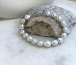Elly’s 17pcs 8.2-10mm White iridescent crinkle Pearls Bracelet: Extreme luster mirrored, 7.8” knotted, S925 silver Bracelet. gift for her Valentine’s Day