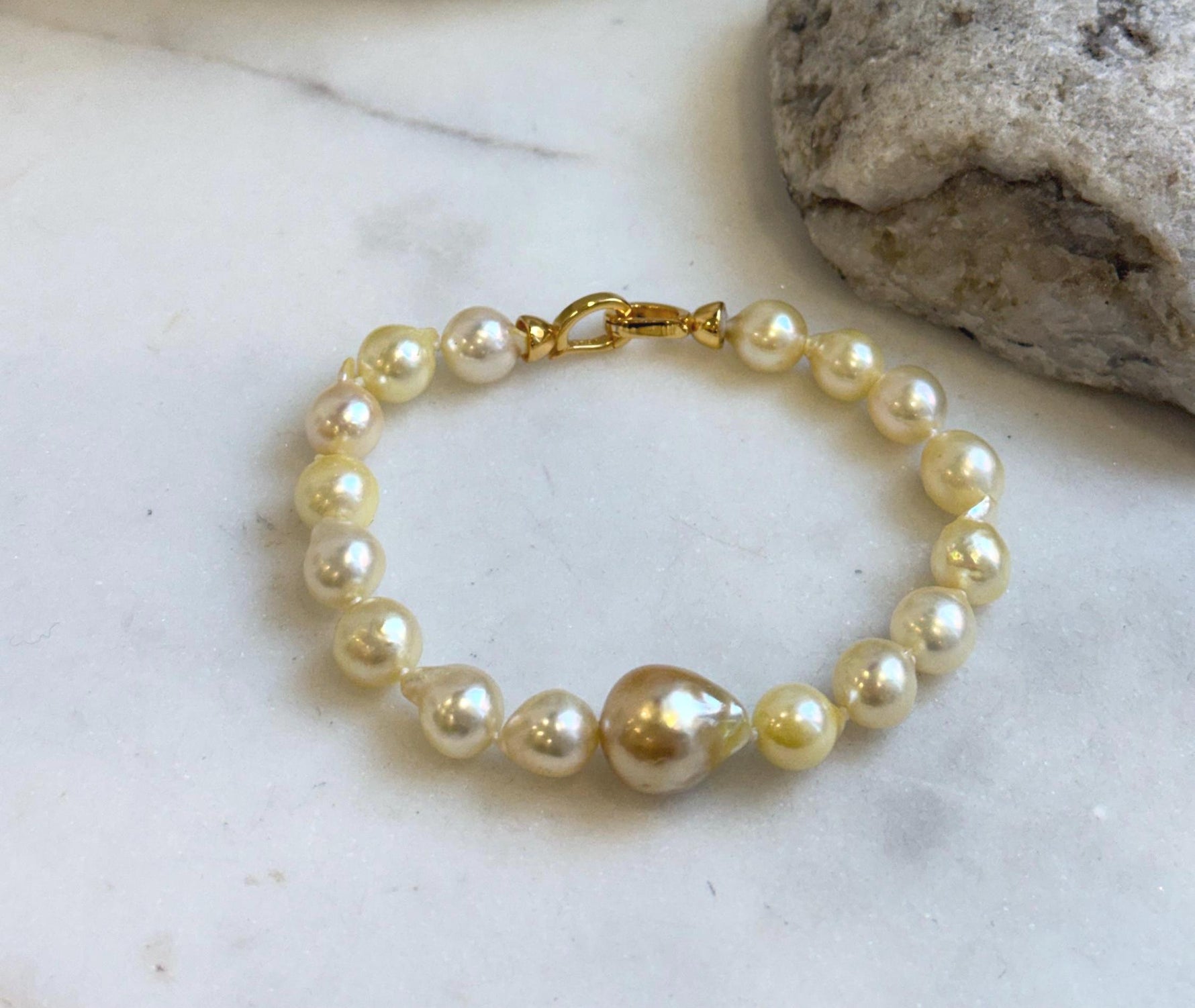 Elly’s 17pcs 8.7-12.1mm Akoya South Sea Golden Ocean Pearls Bracelet: Extreme luster, 7.8” knotted, S925 silver clip. gift for her
