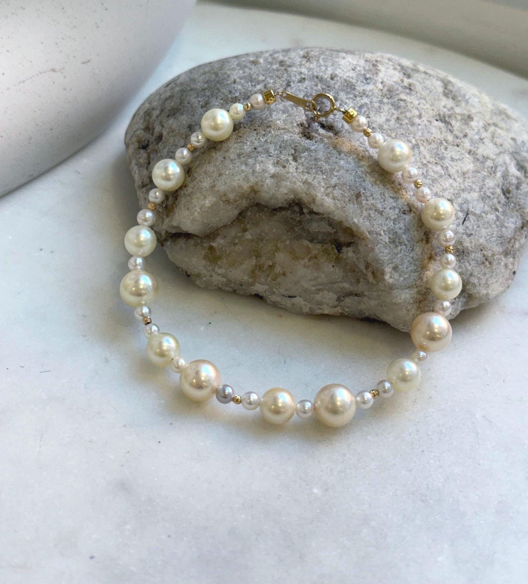 Elly’s Au750 18K gold Akoya Ocean Pearls Bracelet: Extreme luster Mirrored effect, 3.4-7.9mm, 18k Gold beads clips, 7.7” long. gift for her