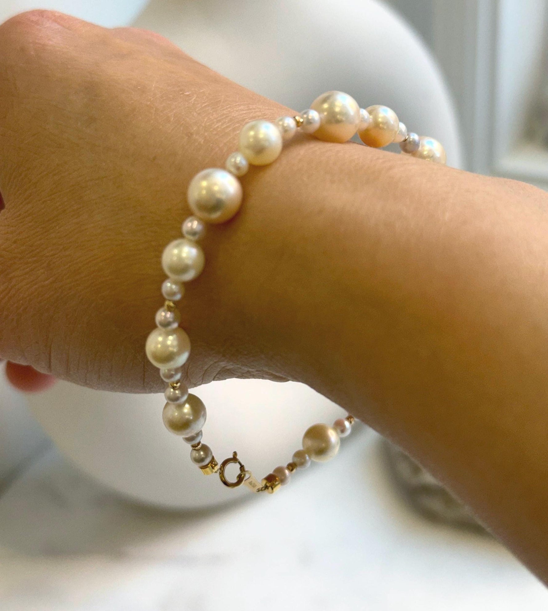 Elly’s Au750 18K gold Akoya Ocean Pearls Bracelet: Extreme luster Mirrored effect, 3.4-7.9mm, 18k Gold beads clips, 7.7” long. gift for her