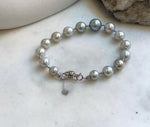 Elly’s Au750 18K gold 14pcs Tahitian Akoya Ocean Pearls Bracelet: Extreme luster Mirrored effect, 6.9-10.7mm, 18k Gold bracelet, 7.8” long, gift for her