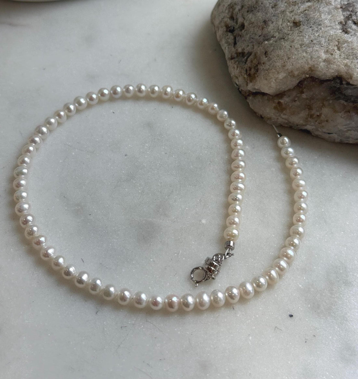 Elly’s white small Pearls Bracelet: Extreme luster mirrored, 4.4-4.8mm, S925 silver magnetic clips Bracelet.
