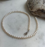 Elly’s white small Pearls Bracelet: Extreme luster mirrored, 4.4-4.8mm, S925 silver magnetic clips Bracelet.