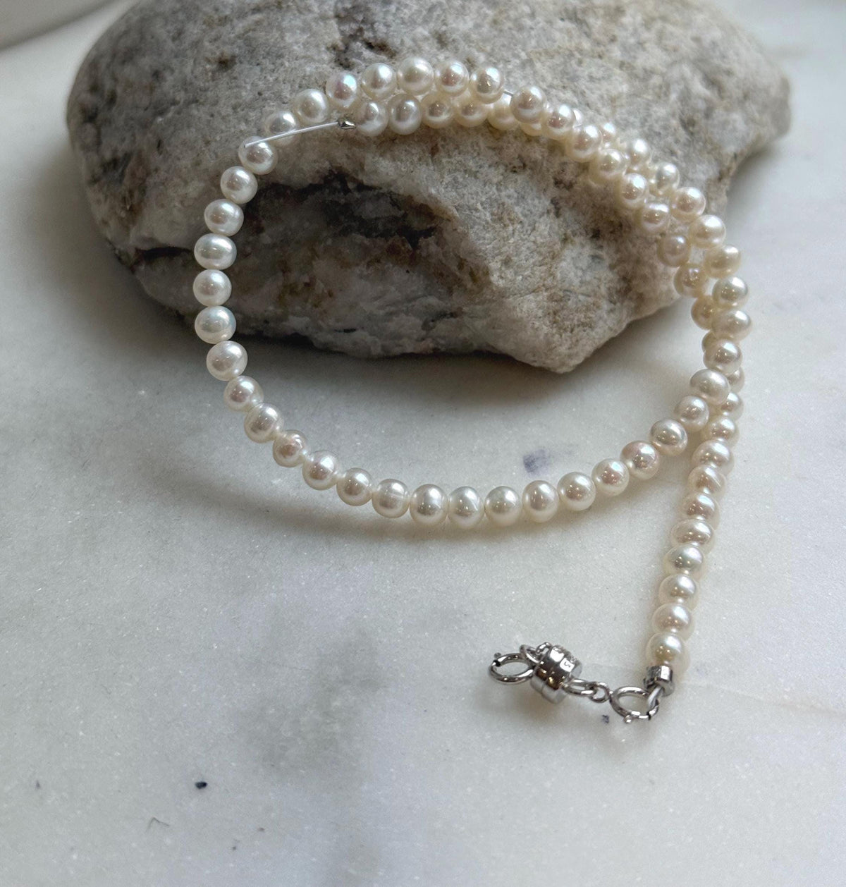 Elly’s white small Pearls Bracelet: Extreme luster mirrored, 4.4-4.8mm, S925 silver magnetic clips Bracelet.