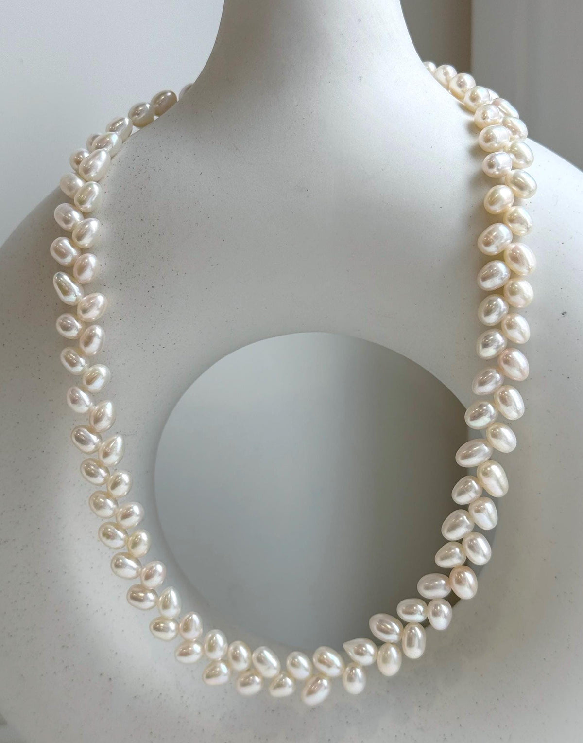 Elly’s White rice Keshi Pearls wheat design Necklace: Extreme luster Mirrored effect, 5-5.5mm, S925 silver clips, to 17.7”long.