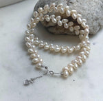 Elly’s White rice Keshi Pearls wheat design Necklace: Extreme luster Mirrored effect, 5-5.5mm, S925 silver clips, to 17.7”long.