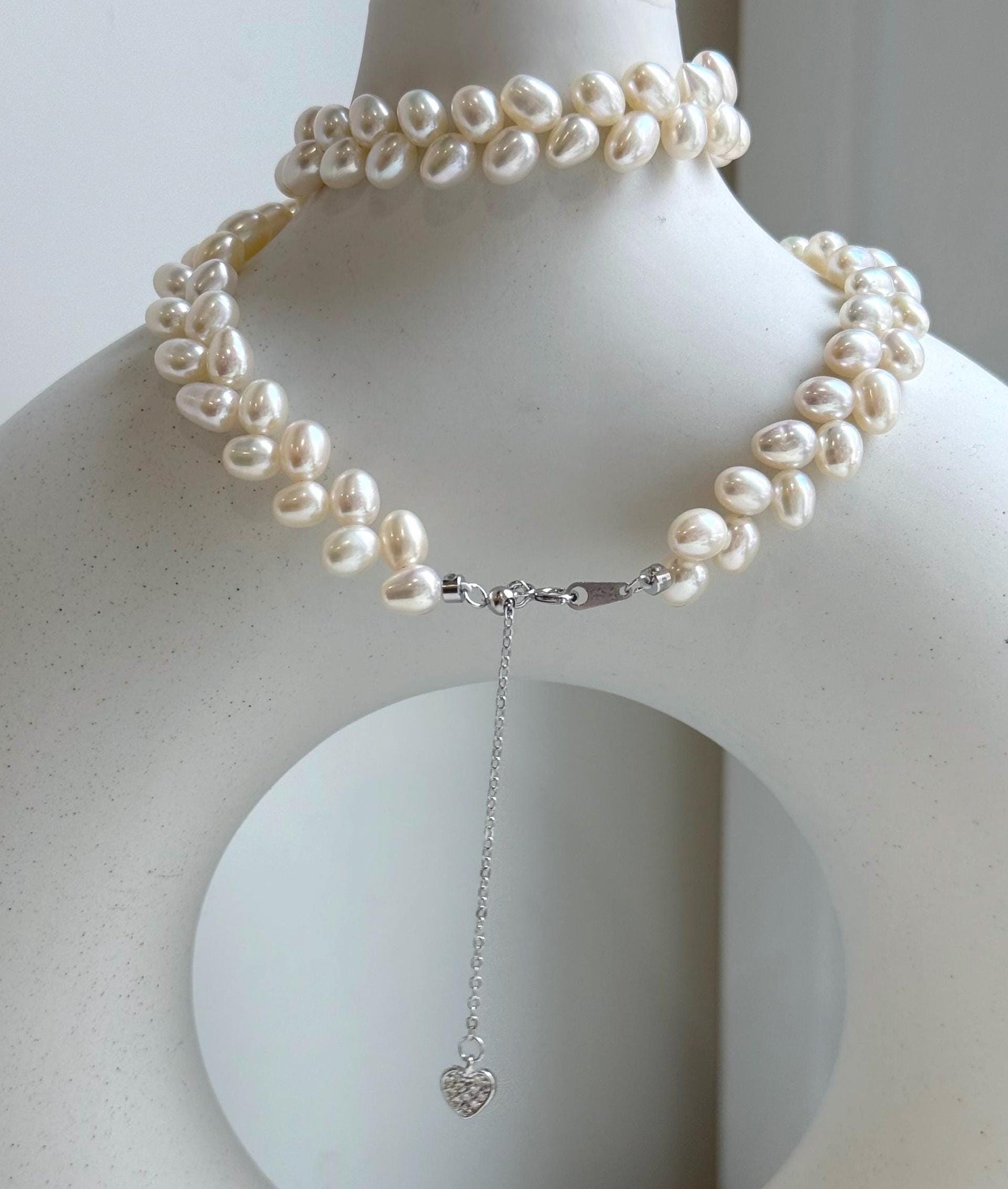 Elly’s White rice Keshi Pearls wheat design Necklace: Extreme luster Mirrored effect, 5-5.5mm, S925 silver clips, to 17.7”long.
