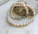 Elly’s 7.7-8.7mm 47pcs Akoya Ivory w/ pink hue ocean pearls necklace choker: Extreme luster mirrored, knotted, 18.2”, S925 silver necklace. gift for her