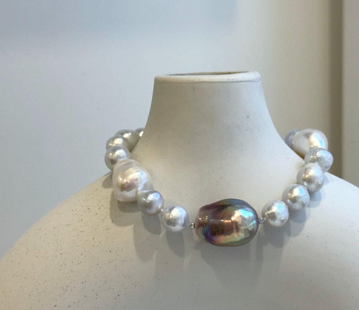 Elly’s 8-14.6mm White metallic rainbow iridescent Pearls Bracelet: Extreme luster mirrored, 8.5” knotted, S925 silver Bracelet.