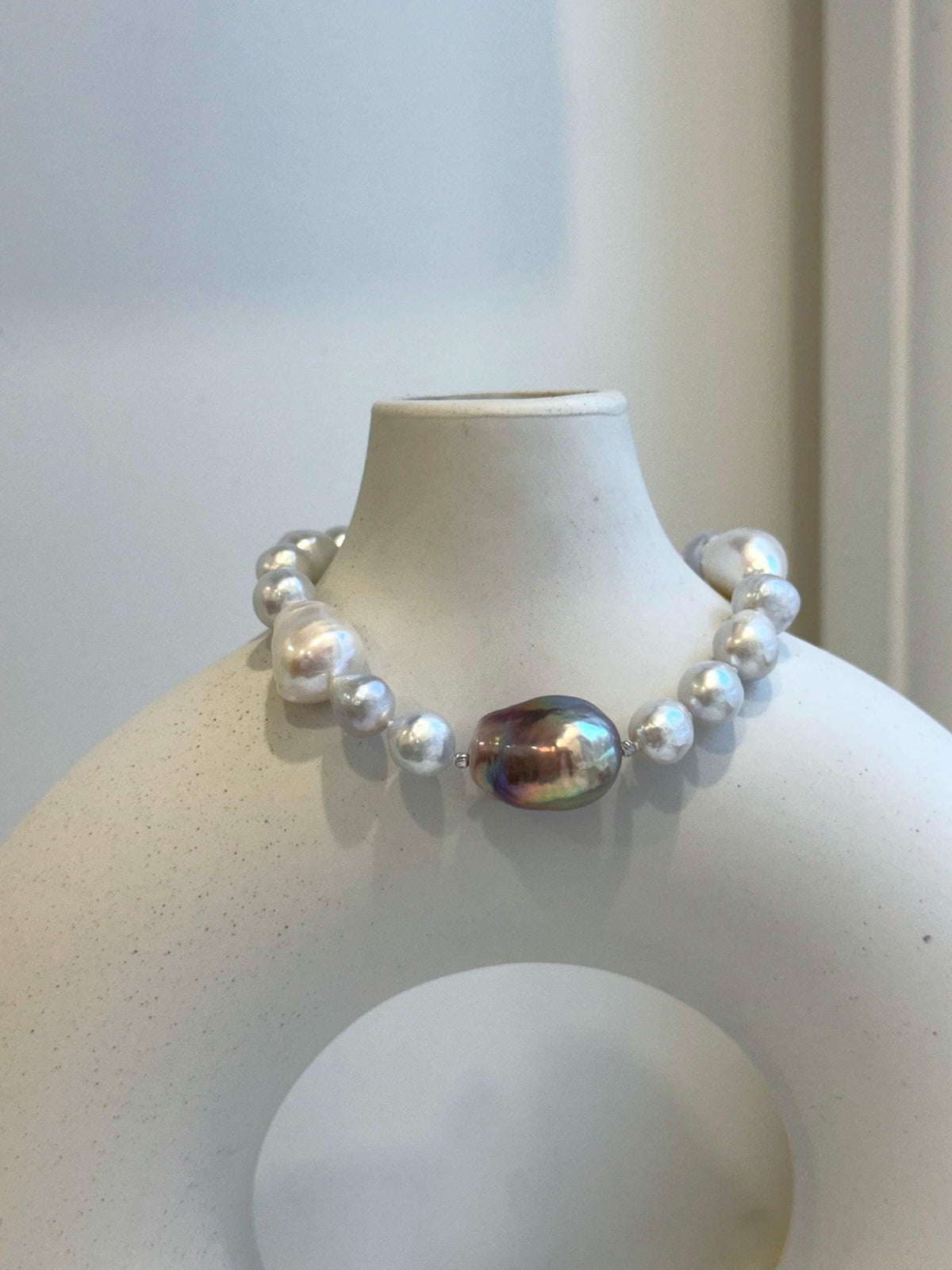 Elly’s 8-14.6mm White metallic rainbow iridescent Pearls Bracelet: Extreme luster mirrored, 8.5” knotted, S925 silver Bracelet.