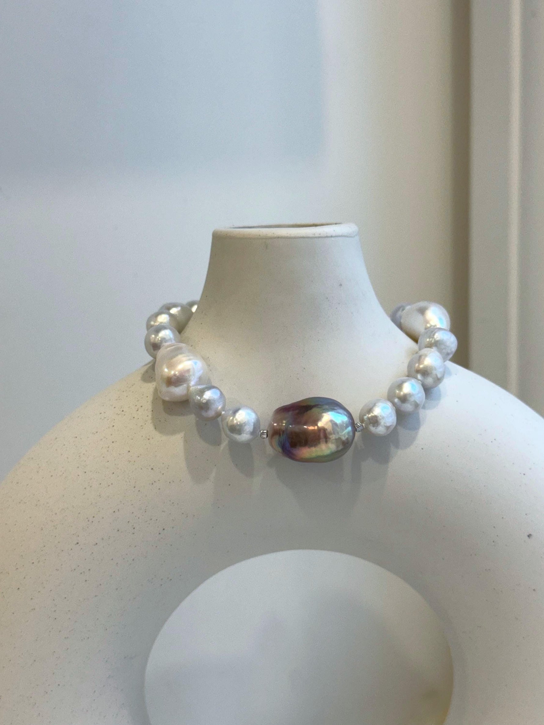 Elly’s 8-14.6mm White metallic rainbow iridescent Pearls Bracelet: Extreme luster mirrored, 8.5” knotted, S925 silver Bracelet.