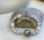 Elly’s 8-14.6mm White metallic rainbow iridescent Pearls Bracelet: Extreme luster mirrored, 8.5” knotted, S925 silver Bracelet.