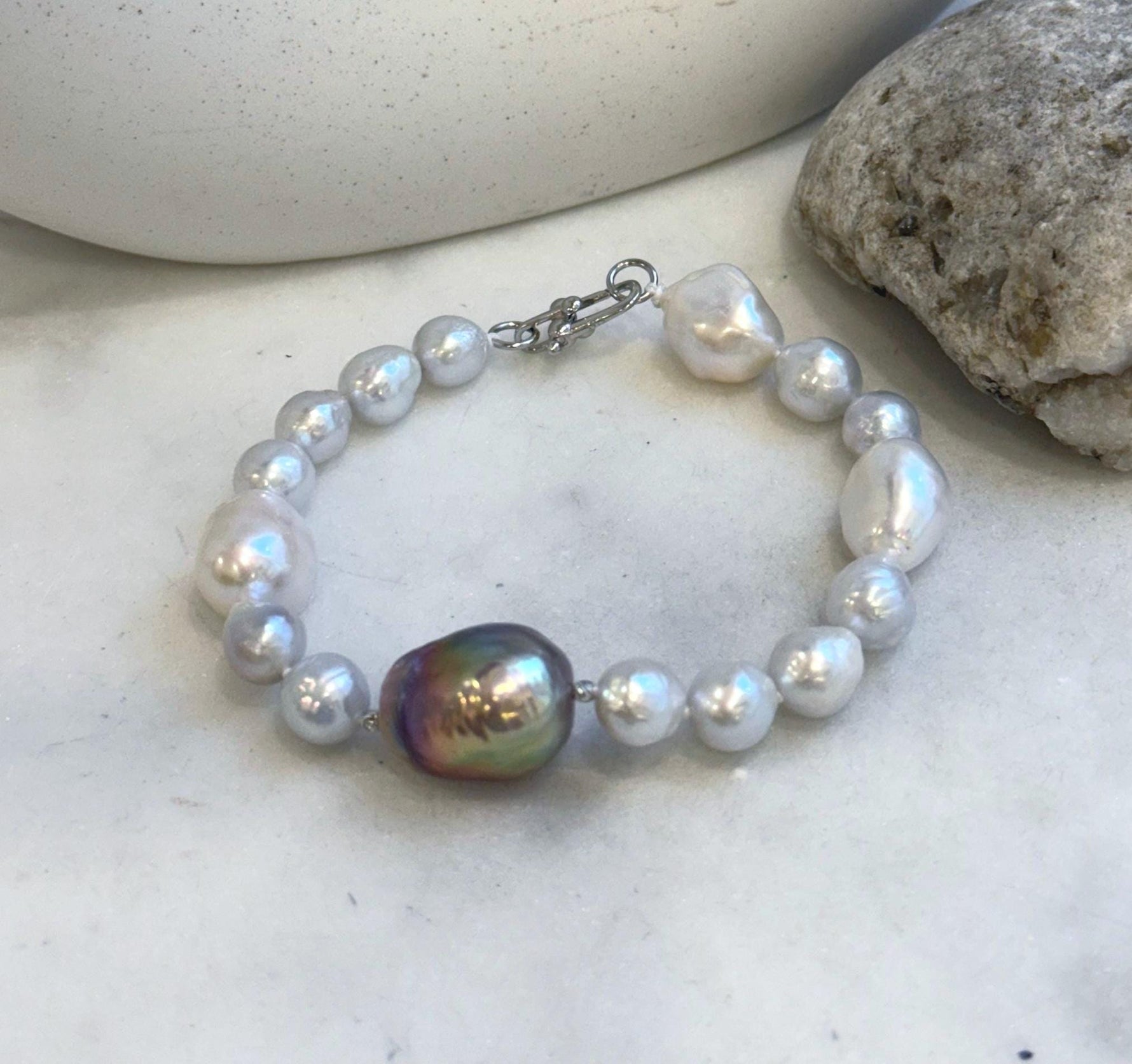 Elly’s 8-14.6mm White metallic rainbow iridescent Pearls Bracelet: Extreme luster mirrored, 8.5” knotted, S925 silver Bracelet.