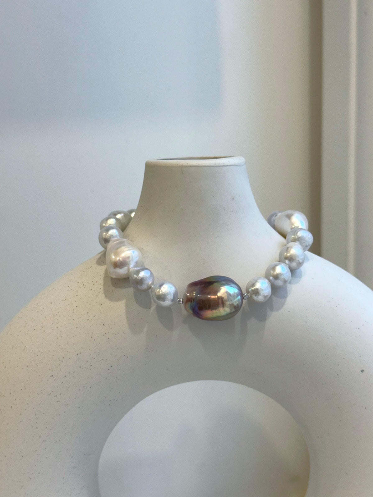 Elly’s 8-14.6mm White metallic rainbow iridescent Pearls Bracelet: Extreme luster mirrored, 8.5” knotted, S925 silver Bracelet.
