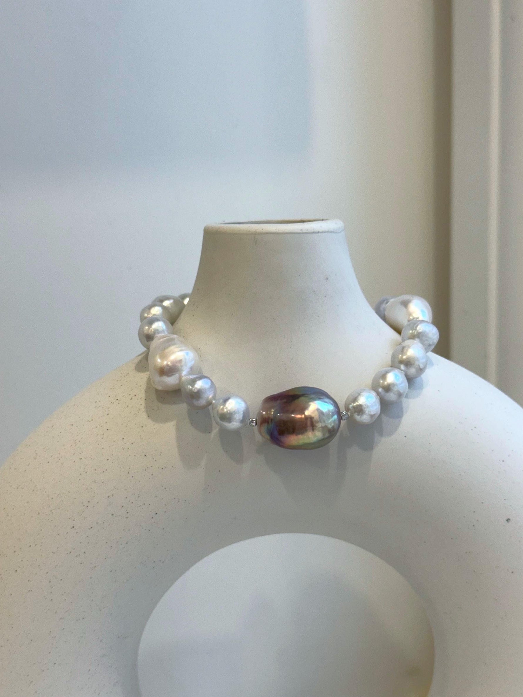 Elly’s 8-14.6mm White metallic rainbow iridescent Pearls Bracelet: Extreme luster mirrored, 8.5” knotted, S925 silver Bracelet.