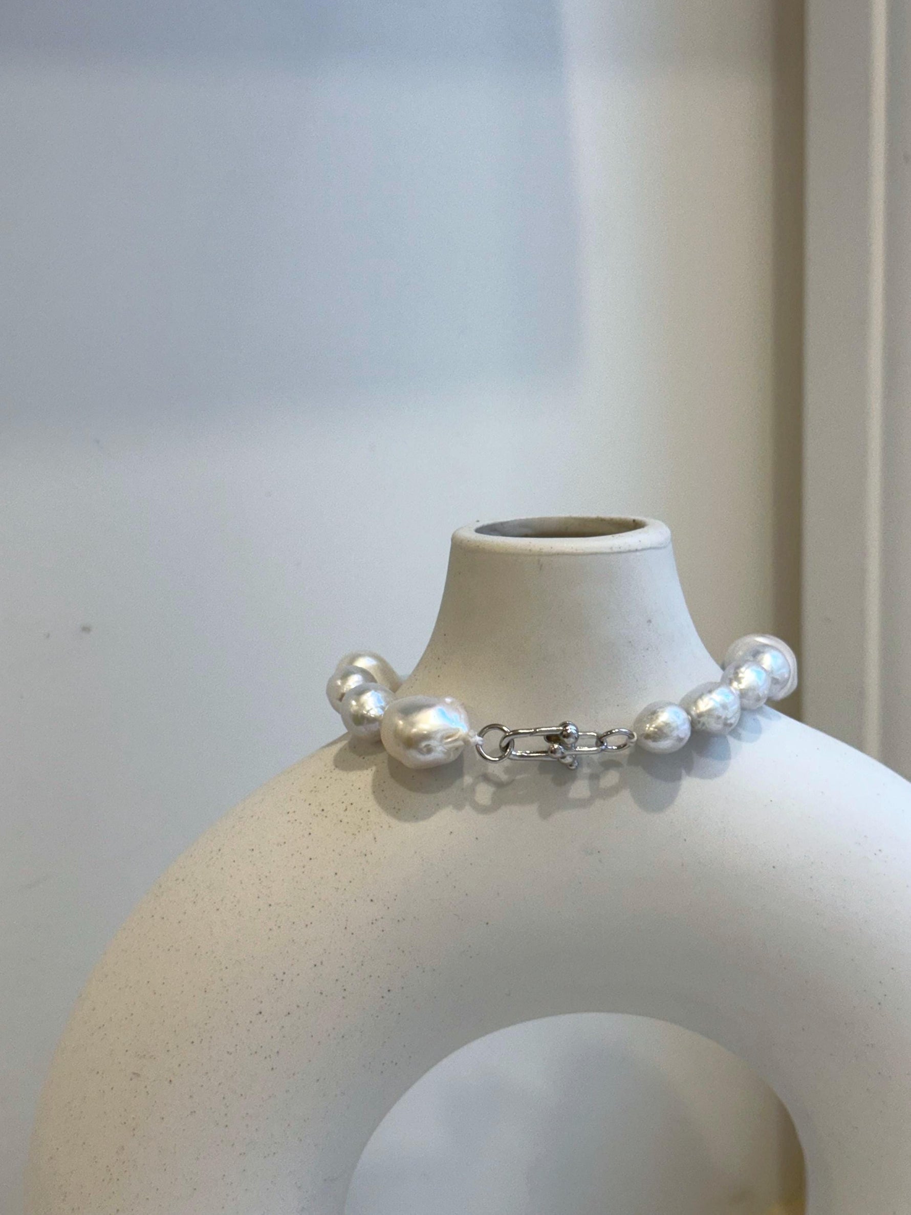 Elly’s 8-14.6mm White metallic rainbow iridescent Pearls Bracelet: Extreme luster mirrored, 8.5” knotted, S925 silver Bracelet.