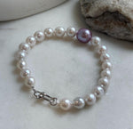 Elly’s 7.7-12.8mm White iridescent purple Pearls Bracelet: Extreme luster mirrored, 8.9” knotted, S925 silver Bracelet. gift for her