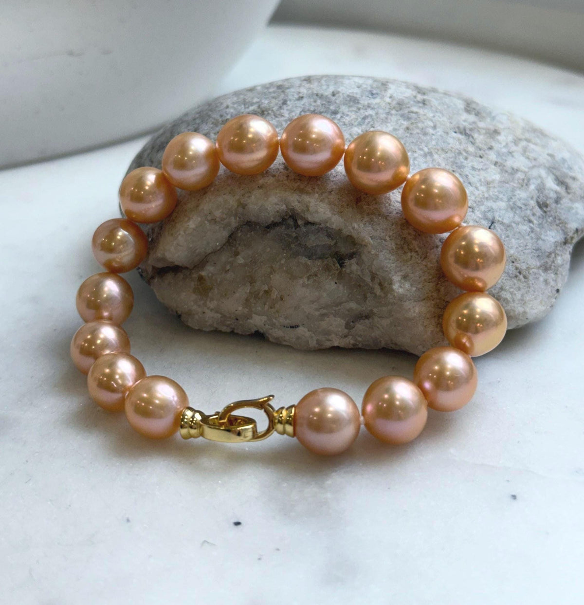 Elly’s 16pcs 9.8-11mm Natural Sunset Peach Gold Edison Pearls Bracelet: Extreme luster mirrored, 8” knotted, S925 silver Bracelet. gift for her