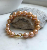 Elly’s 16pcs 9.8-11mm Natural Sunset Peach Gold Edison Pearls Bracelet: Extreme luster mirrored, 8” knotted, S925 silver Bracelet. gift for her anniversary
