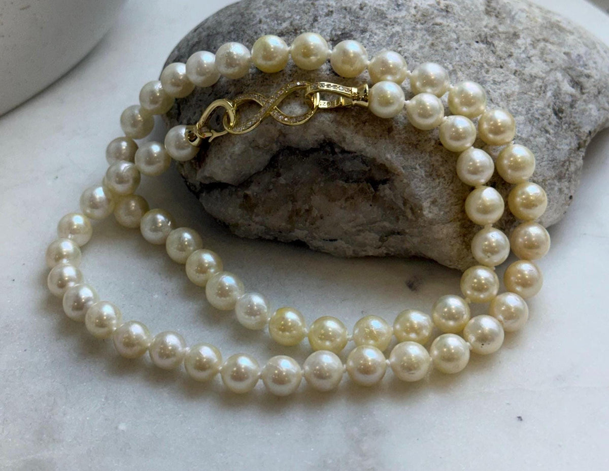 Elly’s 6.8-7.3mm 61pcs Akoya ivory gold ocean pearls necklace:Extreme luster mirrored, knotted, 18.6”, S925 silver necklace strand. gift for her Valentine’s Day