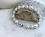 Elly’s 17pcs 8.2-10mm White iridescent crinkle Pearls Bracelet: Extreme luster mirrored, 7.8” knotted, S925 silver Bracelet. gift for her Valentine’s Day