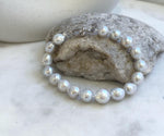 Elly’s 17pcs 8.2-10mm White iridescent crinkle Pearls Bracelet: Extreme luster mirrored, 7.8” knotted, S925 silver Bracelet. gift for her Valentine’s Day