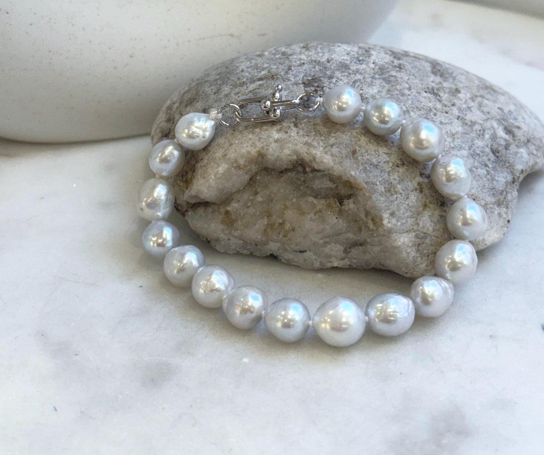 Elly’s 17pcs 8.2-10mm White iridescent crinkle Pearls Bracelet: Extreme luster mirrored, 7.8” knotted, S925 silver Bracelet. gift for her Valentine’s Day