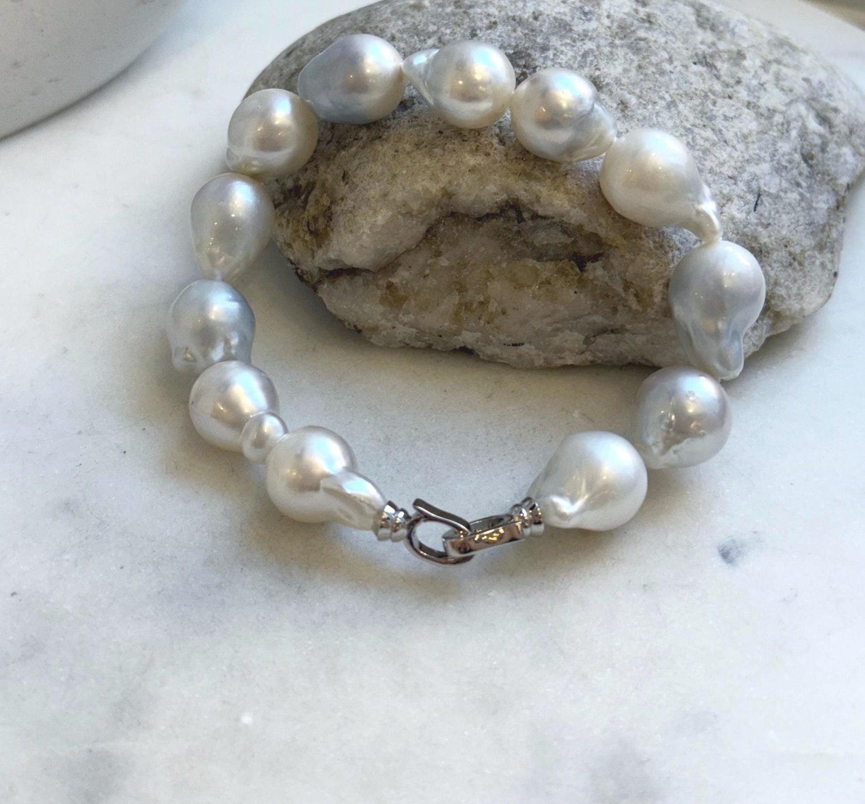 Elly’s 12pcs Australian Ocean white silver Pearls Bracelet: Extreme luster mirrored, to 18.2mm, 8.4” knotted, S925 silver clip. gift for her retirement