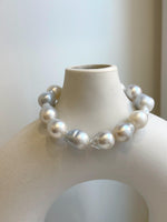 Elly’s 12pcs Australian Ocean white silver Pearls Bracelet: Extreme luster mirrored, to 18.2mm, 8.4” knotted, S925 silver clip.