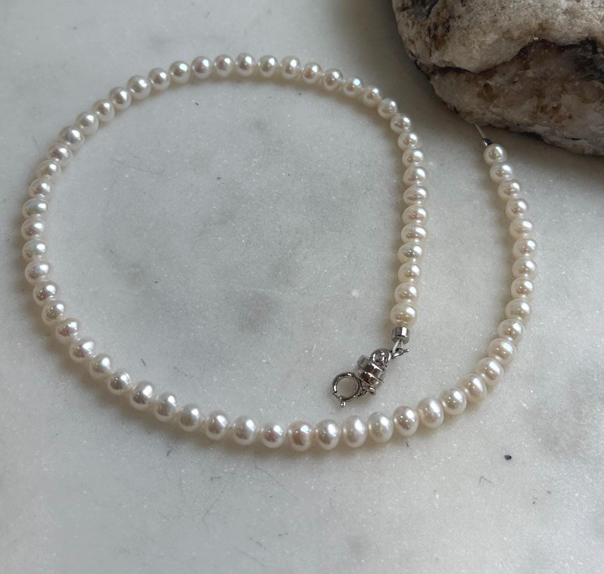 Elly’s white small Pearls Bracelet: Extreme luster mirrored, 4.4-4.8mm, S925 silver magnetic clips Bracelet.