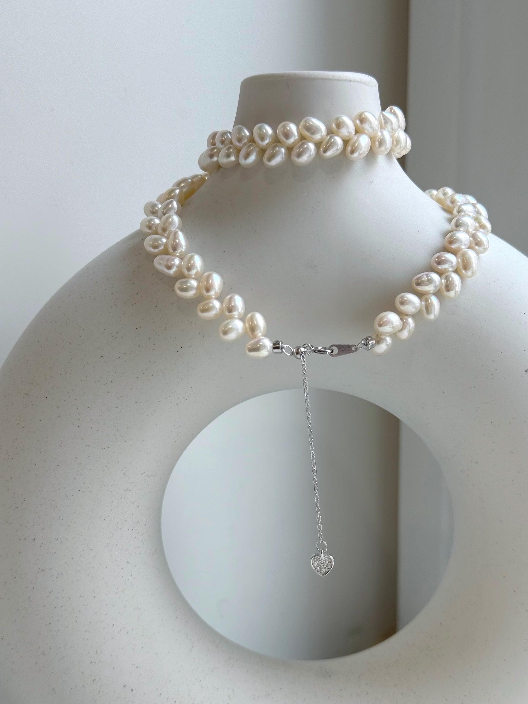 Elly’s White rice Keshi Pearls wheat design Necklace: Extreme luster Mirrored effect, 5-5.5mm, S925 silver clips, to 17.7”long.