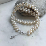 Elly’s White rice Keshi Pearls wheat design Necklace: Extreme luster Mirrored effect, 5-5.5mm, S925 silver clips, to 17.7”long.