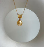 Elly’s 10.6mm South Sea Gold iridescent ocean Pearl pendant: Extreme luster mirrored. S925 silver with gold plated cool pendant set. gift for her