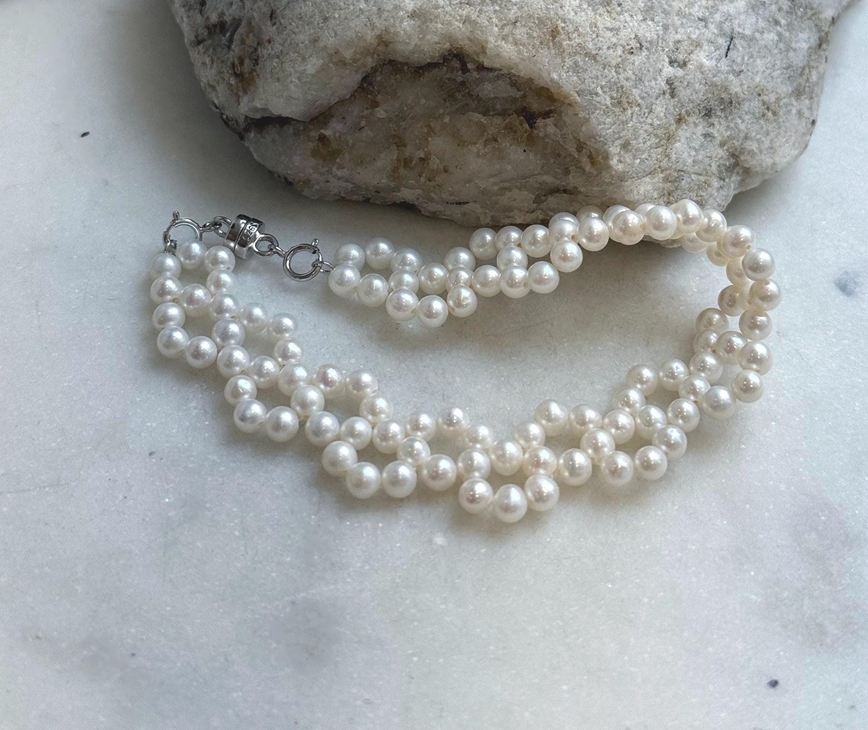 Elly’s 3-ply 4-4.5mm white pearls bracelet: Extreme luster, Handmade braided, 6.9”, S925 silver magnetic clips bracelet. daily office pearl bracelet