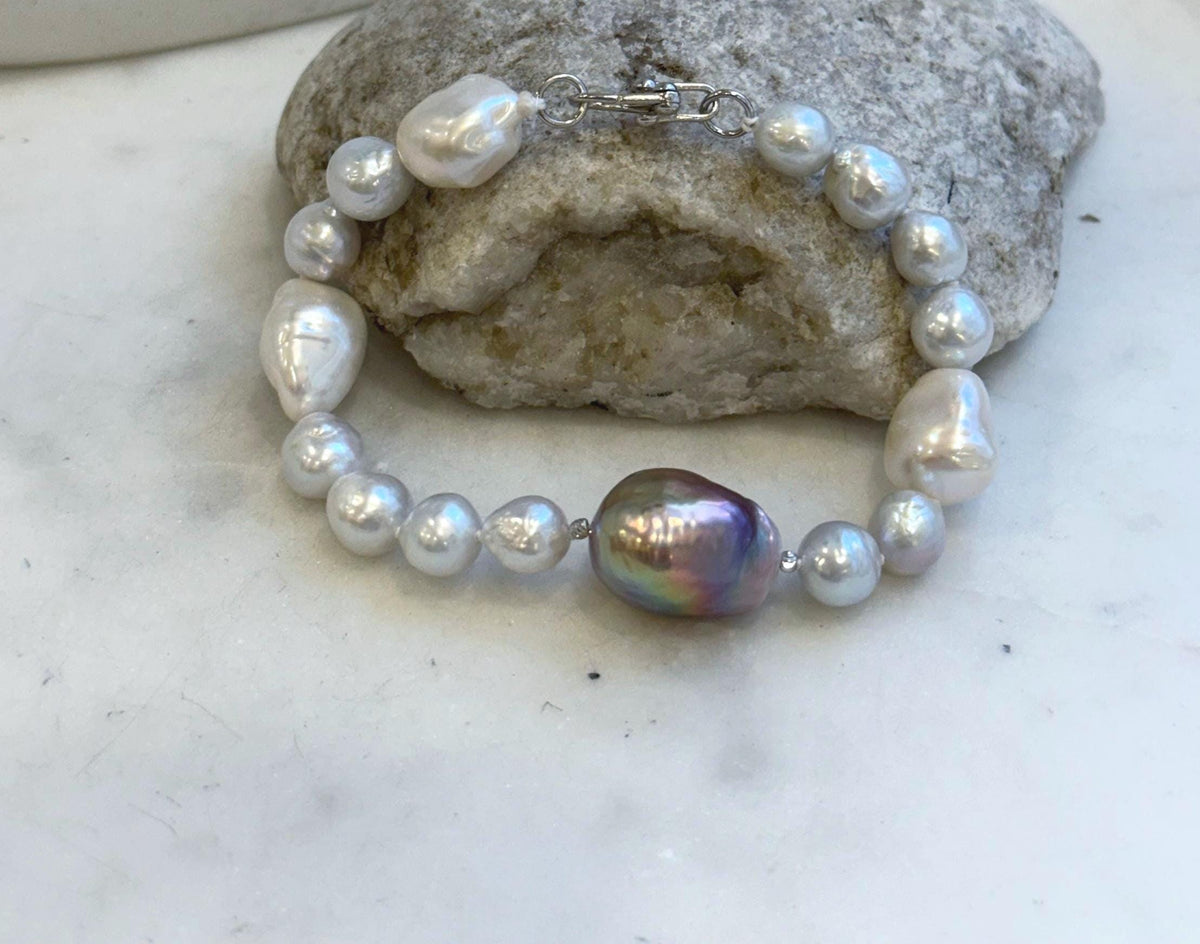 Elly’s 8-14.6mm White metallic rainbow iridescent Pearls Bracelet: Extreme luster mirrored, 8.5” knotted, S925 silver Bracelet.