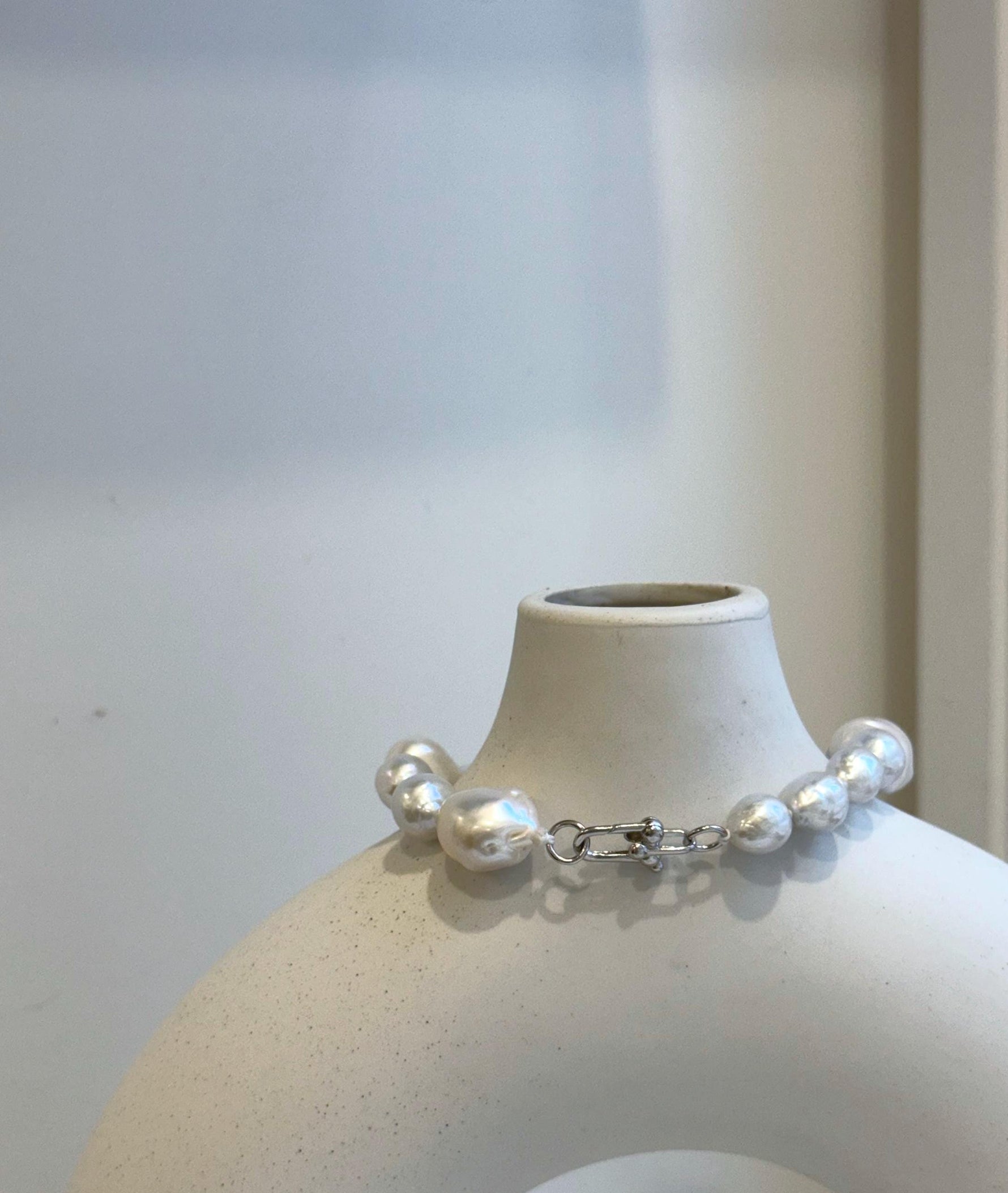 Elly’s 8-14.6mm White metallic rainbow iridescent Pearls Bracelet: Extreme luster mirrored, 8.5” knotted, S925 silver Bracelet.