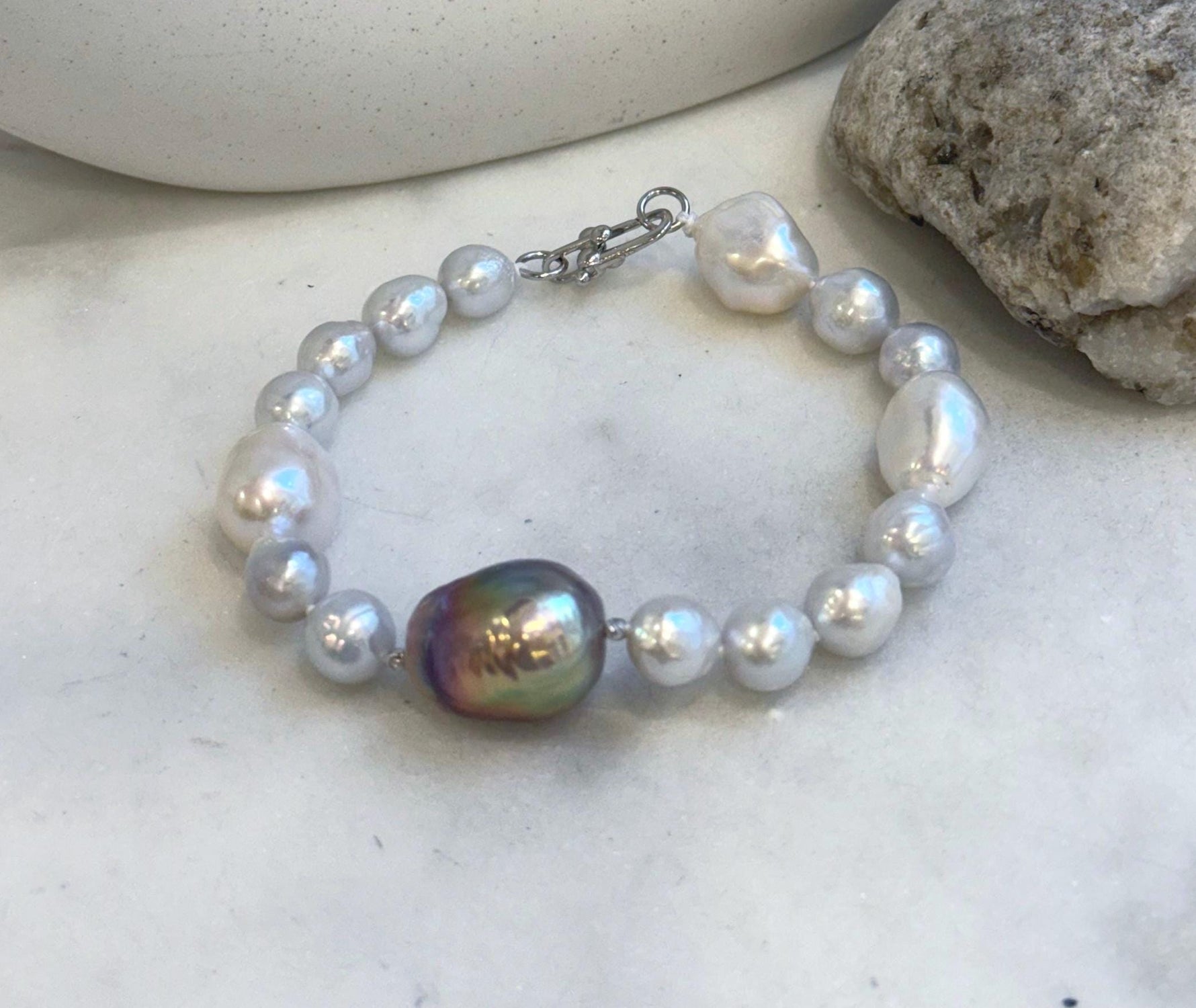 Elly’s 8-14.6mm White metallic rainbow iridescent Pearls Bracelet: Extreme luster mirrored, 8.5” knotted, S925 silver Bracelet.