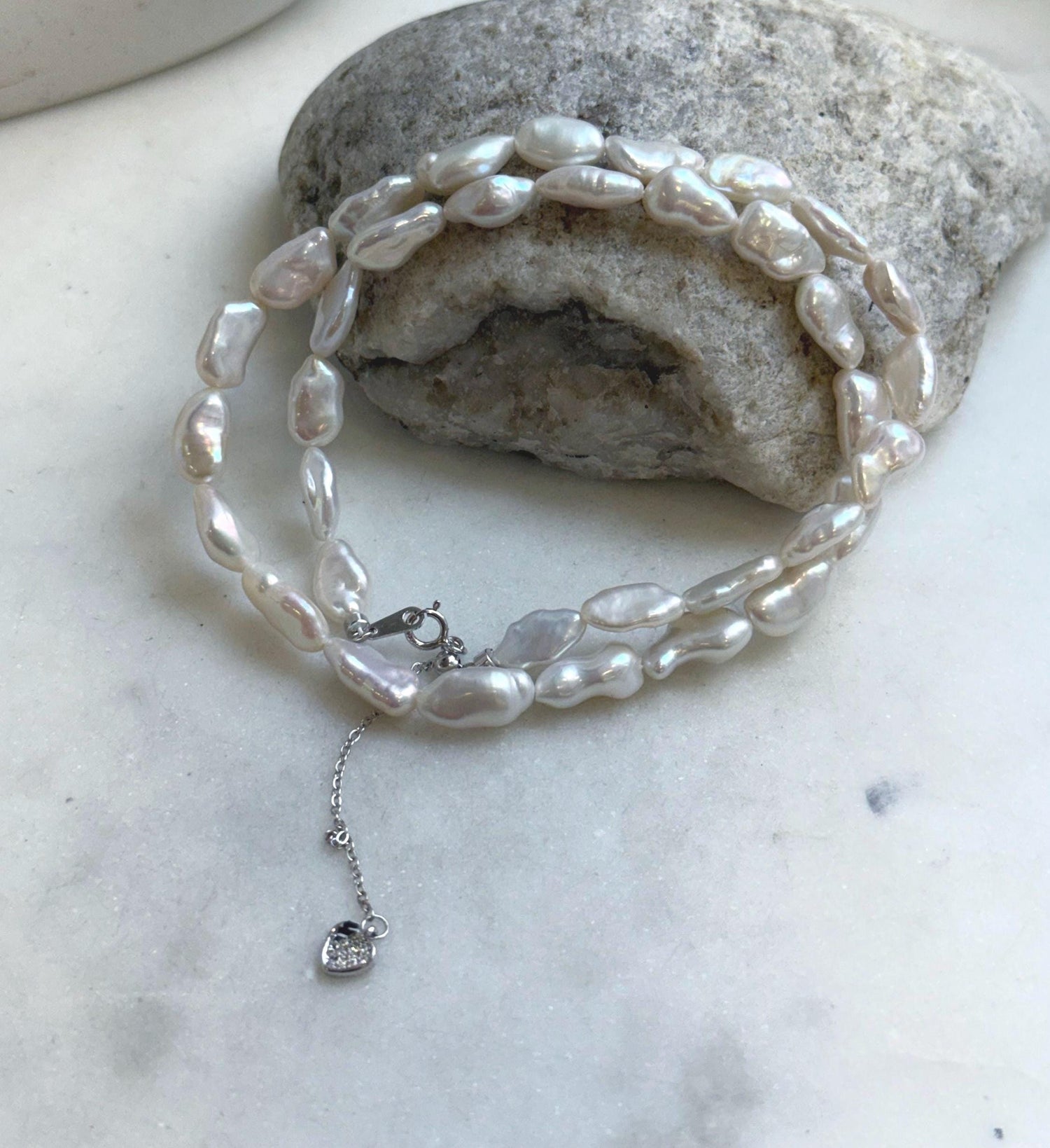 Elly’s White iridescent Keshi Pearls Necklace Strand: Extreme luster mirrored, 6.5-7mm, 18.5”, S925 silver necklace.