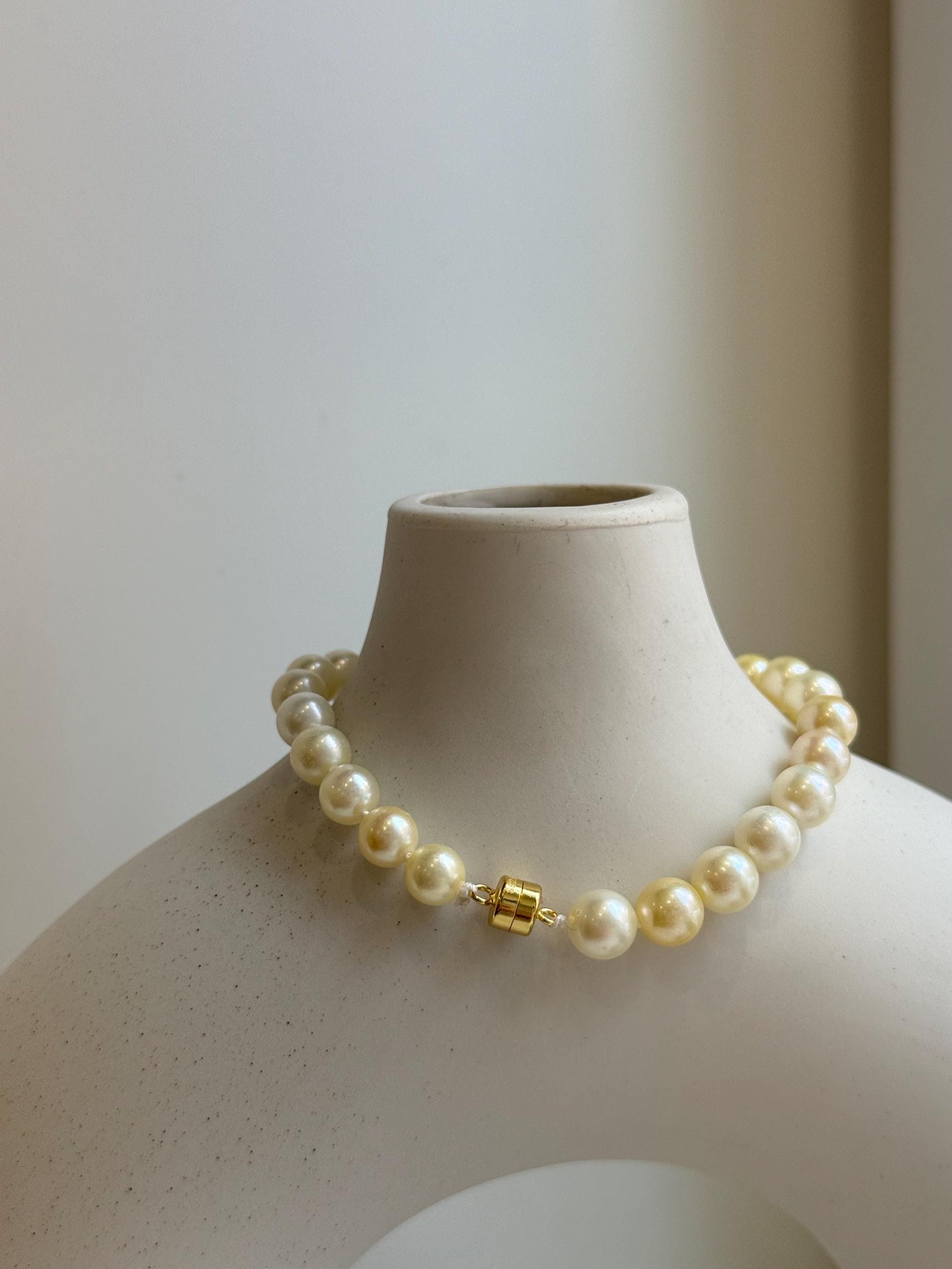 Elly’s 6.6-7mm Genius Akoya golden ocean Pearls Natural Amber Bracelet: Extreme luster mirrored, 7.6” knotted, S925 silver magnetic clips. gift for her