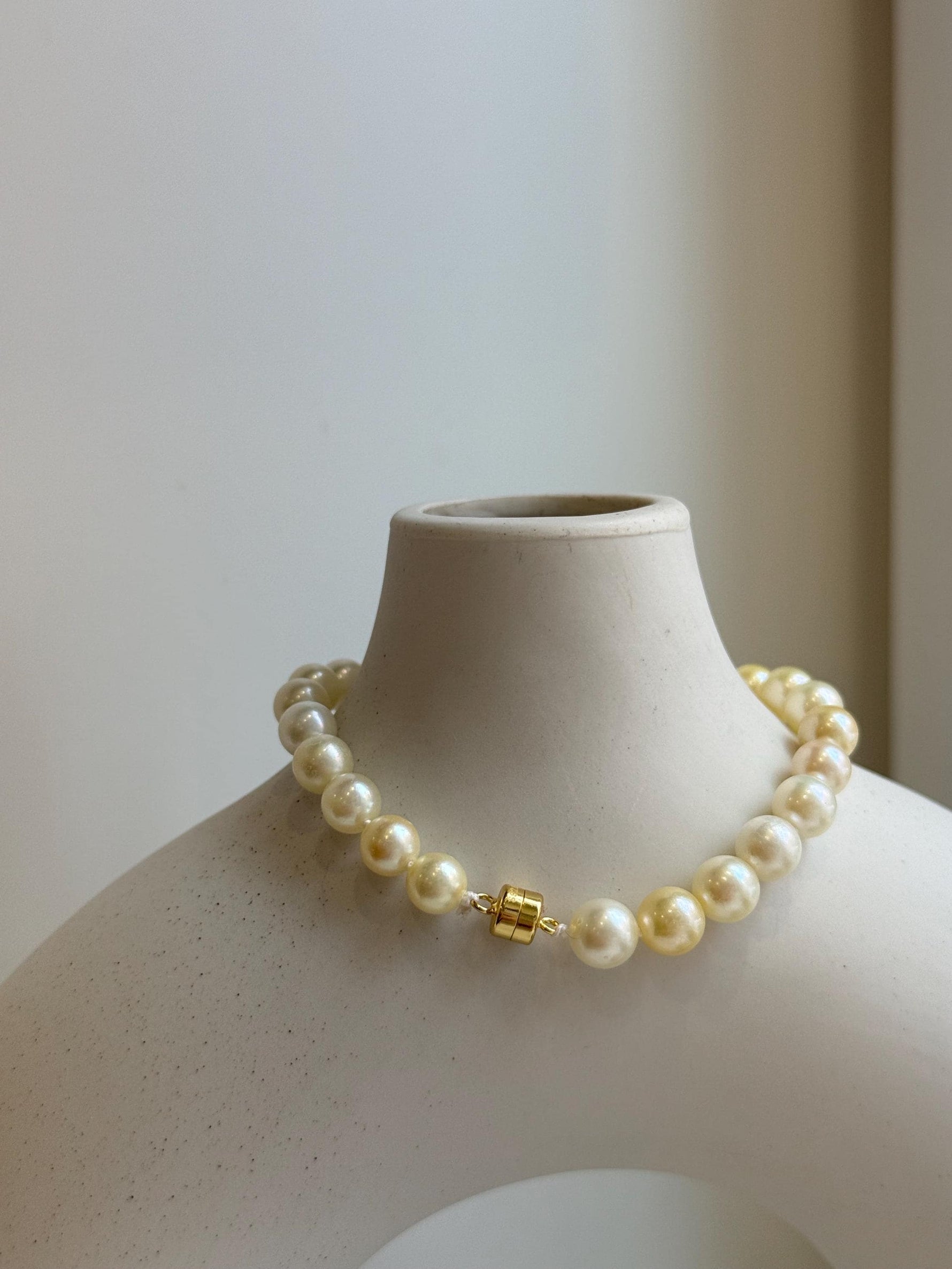 Elly’s 6.6-7mm Genius Akoya golden ocean Pearls Natural Amber Bracelet: Extreme luster mirrored, 7.6” knotted, S925 silver magnetic clips. gift for her