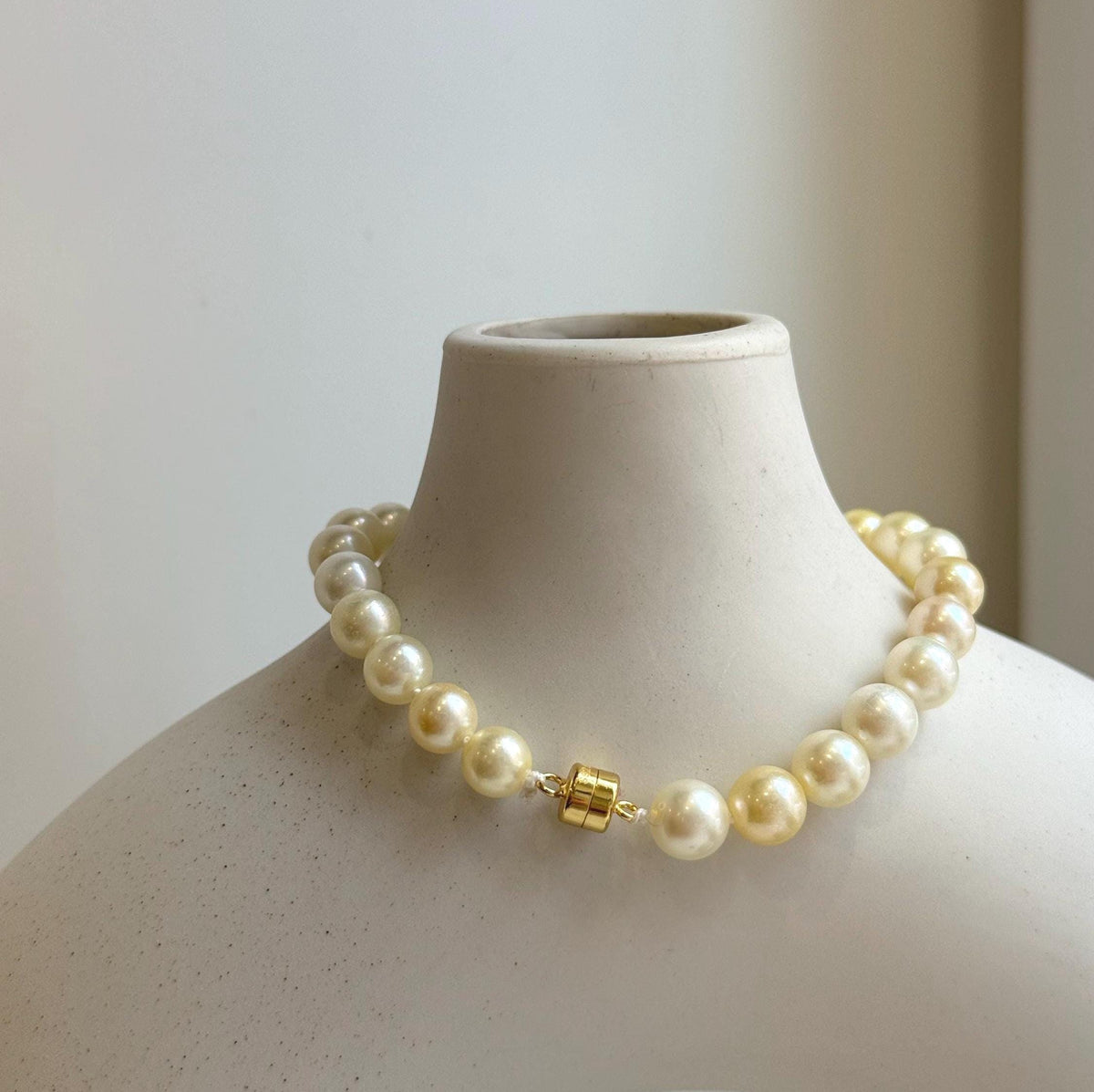 Elly’s 6.6-7mm Genius Akoya golden ocean Pearls Natural Amber Bracelet: Extreme luster mirrored, 7.6” knotted, S925 silver magnetic clips. gift for her anniversary