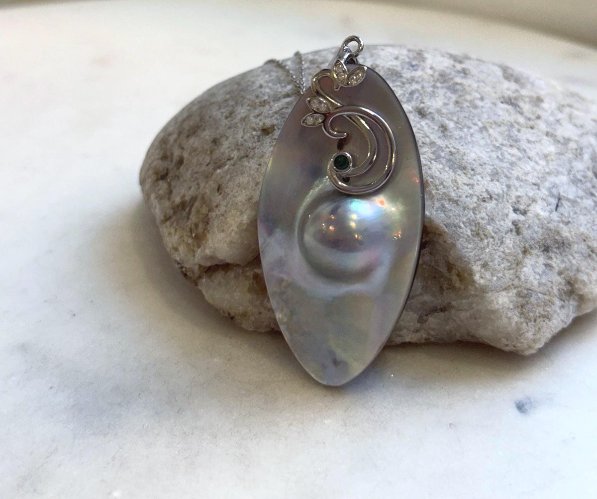 Elly’s 26.6x50mm silver iridescent  Australian Ocean Mabe Pendant : Extreme luster, S925 silver floral pendant, with chain. gift for her