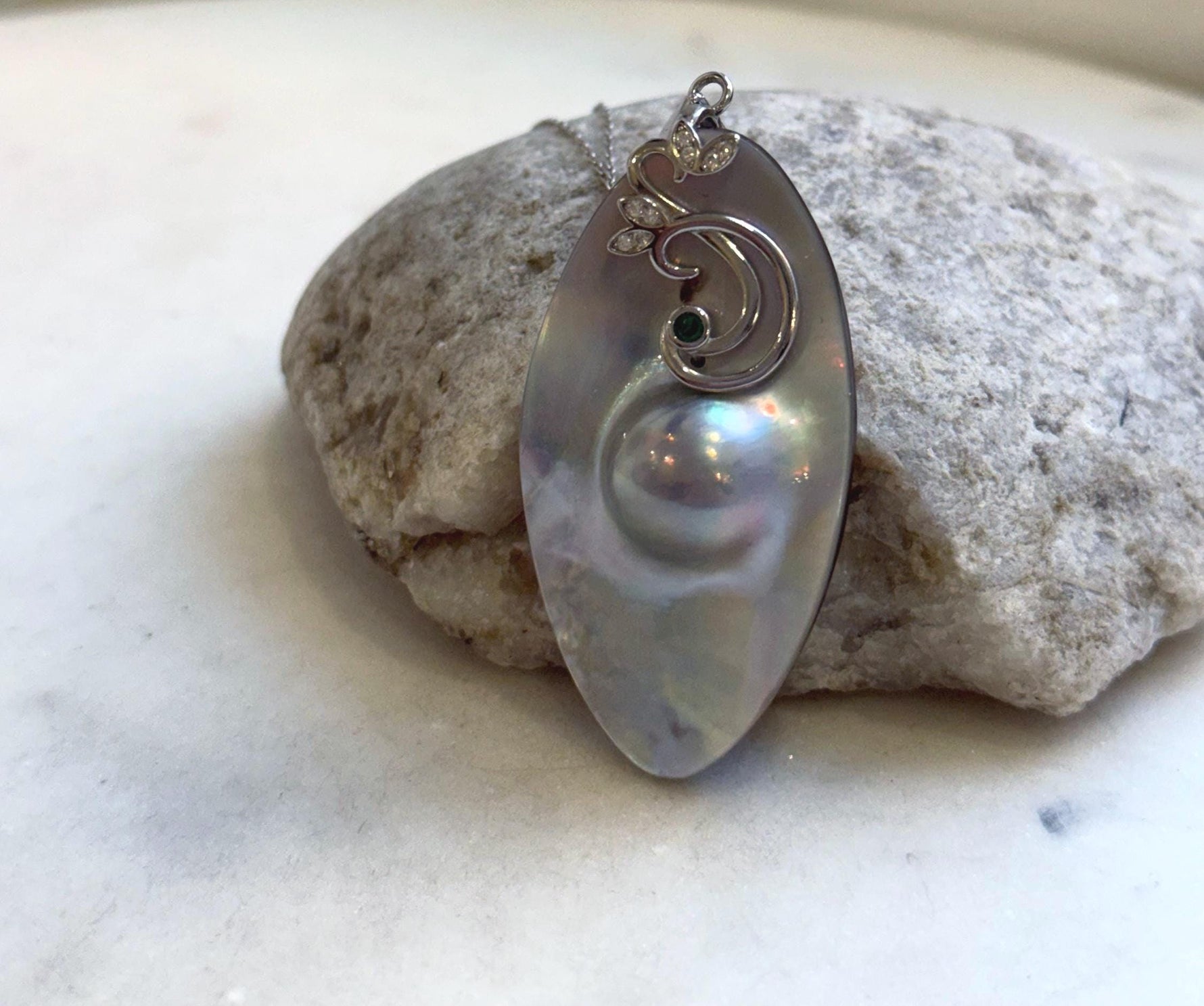 Elly’s 26.6x50mm silver iridescent  Australian Ocean Mabe Pendant : Extreme luster, S925 silver floral pendant, with chain. gift for her
